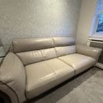 DFS Three seater + footstool - leather two tone