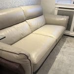DFS Three seater + footstool - leather two tone
