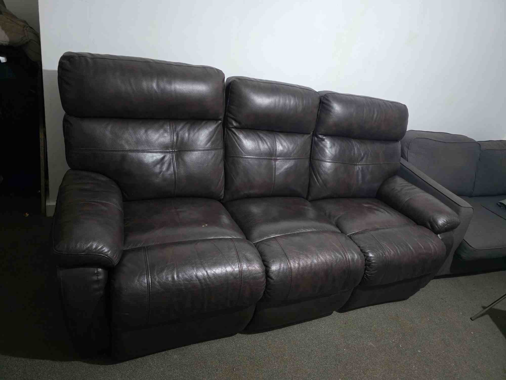 Dark brown 3 seater sofa with 2 seat having manual recliner.