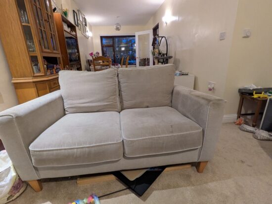 Furniture Village Modern 2-Seater Sofa with Clean Lines and Wooden Legs